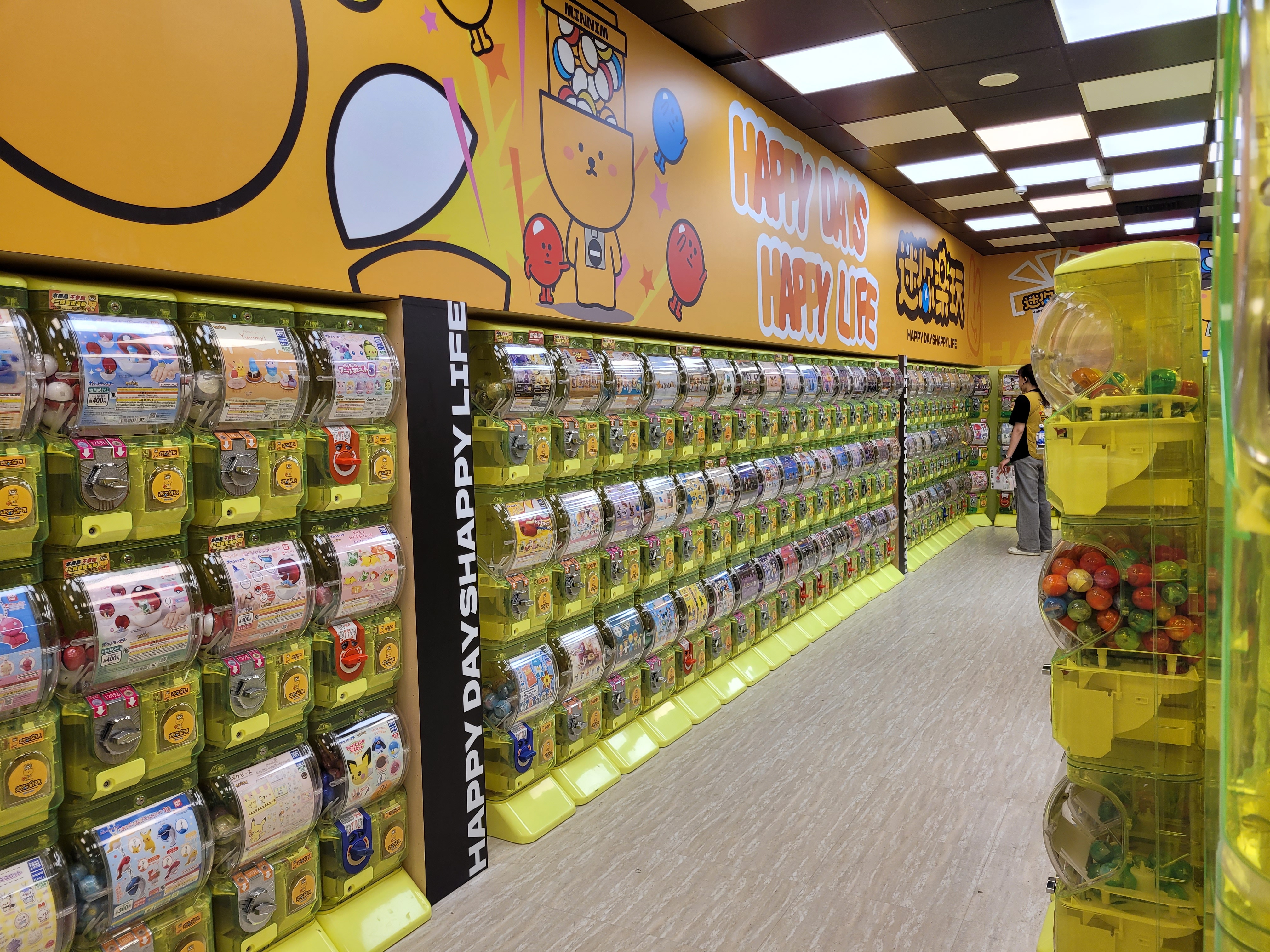 18/03/2025 - Gashapon -
					Gashapon are vending machines that dispense toys in capsules.
					They are very popular in Japan and Taiwan, and you can find them everywhere in the streets, or even entire rooms of it like on this picture.
					They are often used to sell toys, figurines, and other collectibles.
					They are very popular among children and adults, and are often used as a way to collect and trade items.