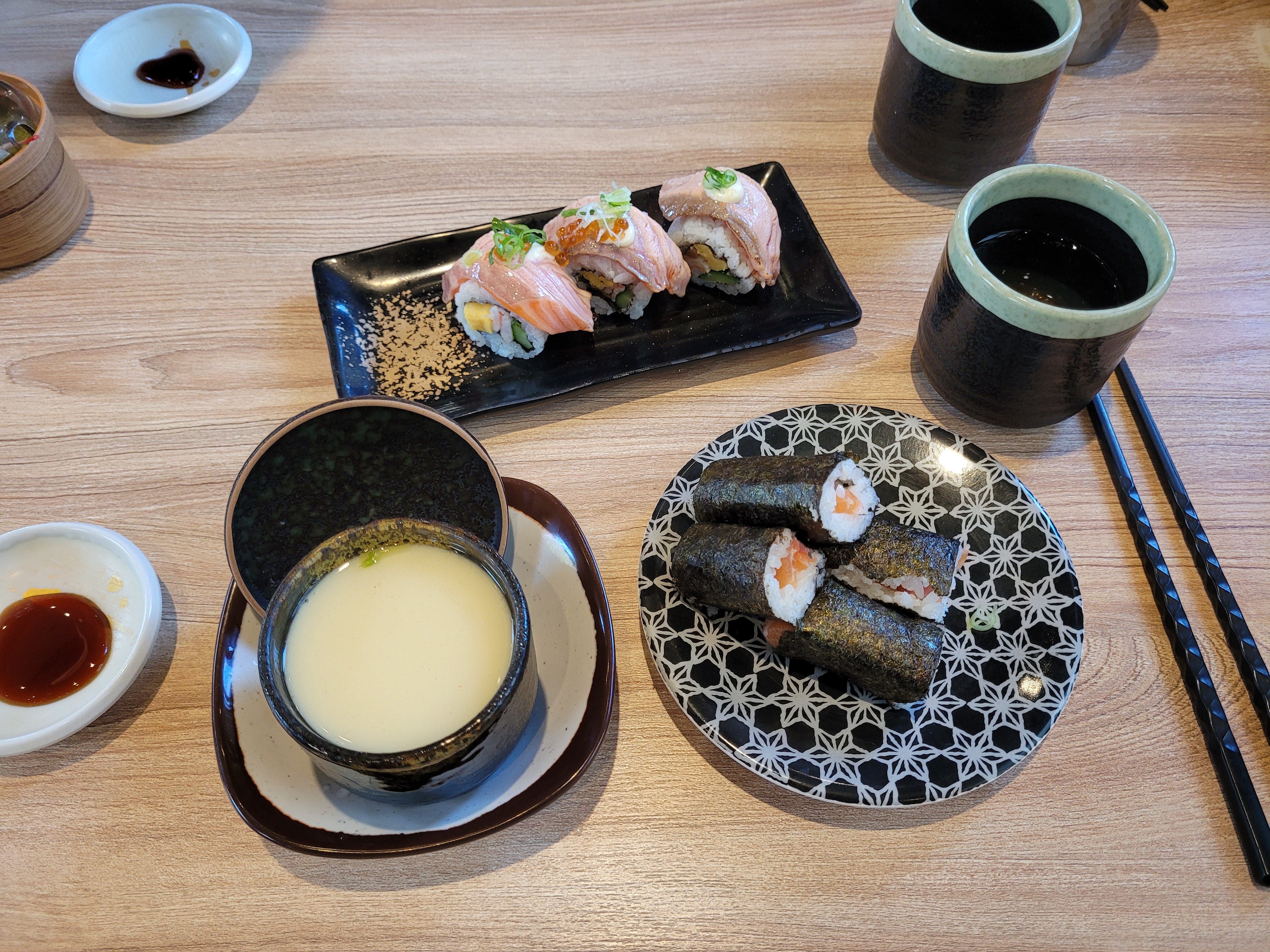 28/03/2025 - Japanese Restaurant -
					This picture was taken in a traditional Japanese restaurant in Chiayi.
					We ate a lot of different sushi, sashimi, and other Japanese food.
					Every dish is served through a conveyor belt with 'space ships' that bring the food to your table.
					The food we ate was based on seafood, such as salmon, tuna, shrimp, crab and even eel!
					It was by far the best japanese restaurant I have ever been to.