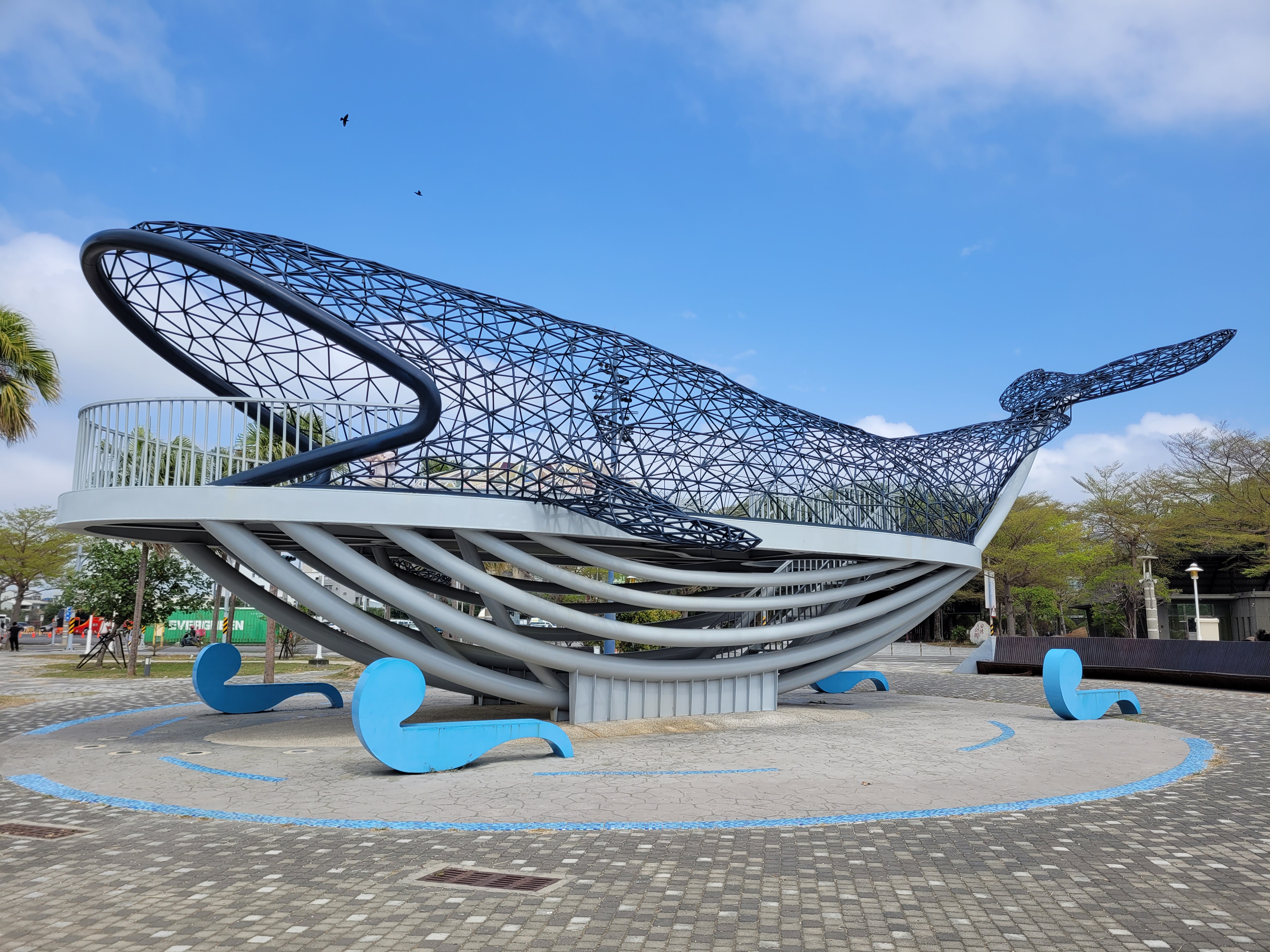 01/04/2025 - Big Fish -
					For the first of April, here is a picture of the outside of 'Big Fish's Blessing' in Tainan, 
					the huge whale structure I have shown earlier located near the coast. Big fish!